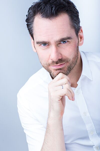 Portraitfoto von Alexander Geller.