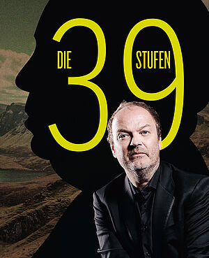 Buchcover von "Die 39 Stufen". Davor ein Portraitfoto des Autoren Jens Wawrczenk. Das Cover zeigt die Silhouette des Kopfes eines Mannes, daruf steht der Titel in gelben Buchstaben. Die "39" sticht der Größe wegen hervor. Jens Wawrczenk ist in einen schwarzen Anzug gekleidet und blickt den Betrachter an.